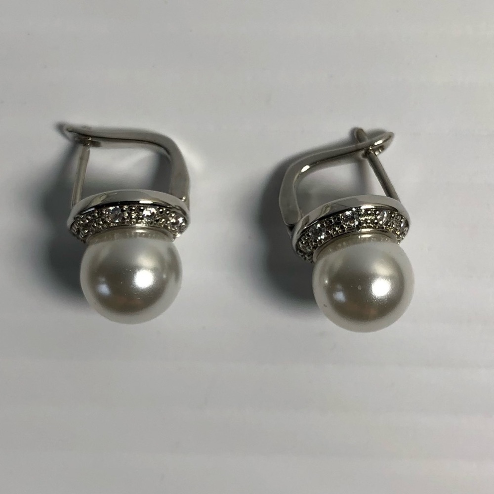 2/$19 silver tone with rhinestones and faux Pearl earrings